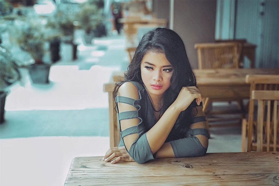 Woman sitting alone