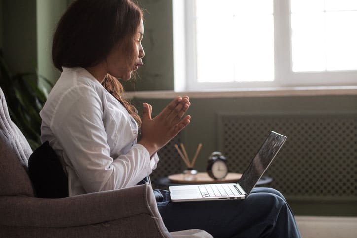 Female Therapist Performing Telehealth Psychotherapy in Illinois