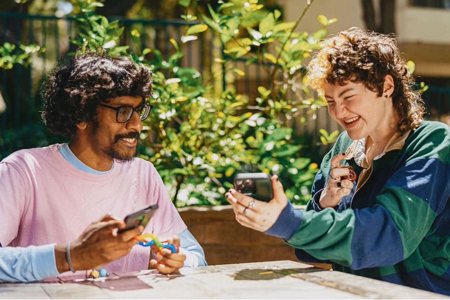 Couple on their phones